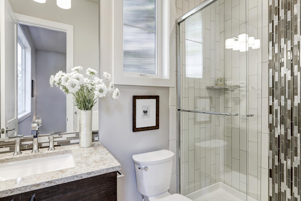 Bathroom with subway tile shower