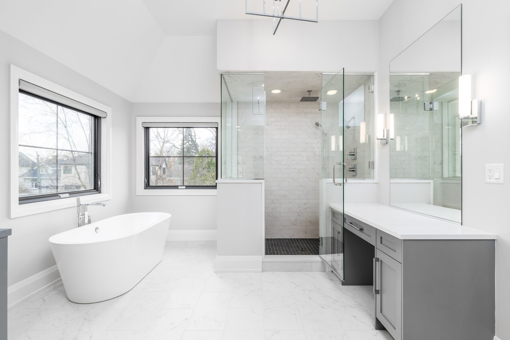 Bathroom with walk in shower and bath tub